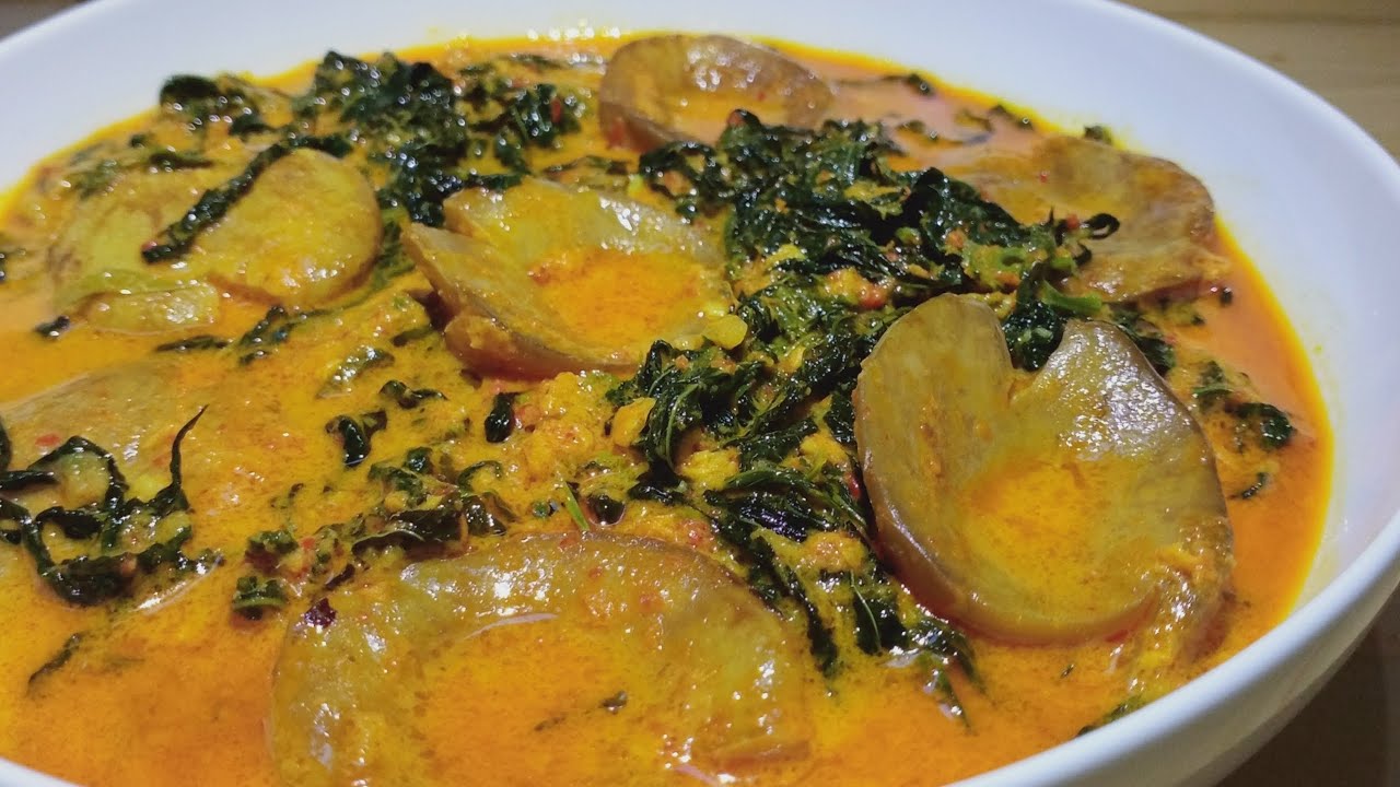 gulai pucuak ubi jengkol